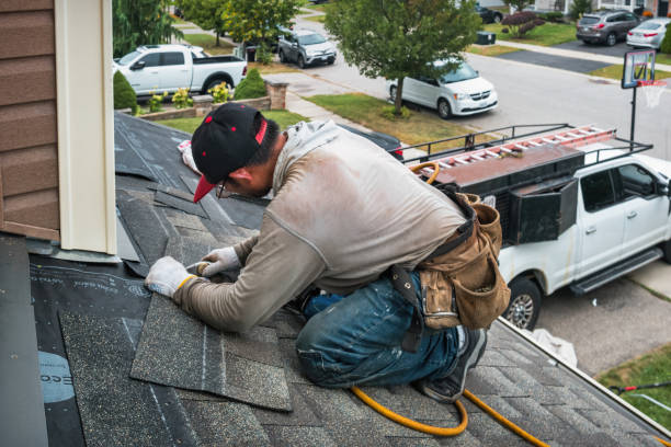 Professional Gutter Repair And Installation technician working in Harwick, PA